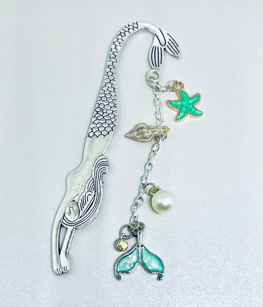 Silver Mermaid And Her Treasures